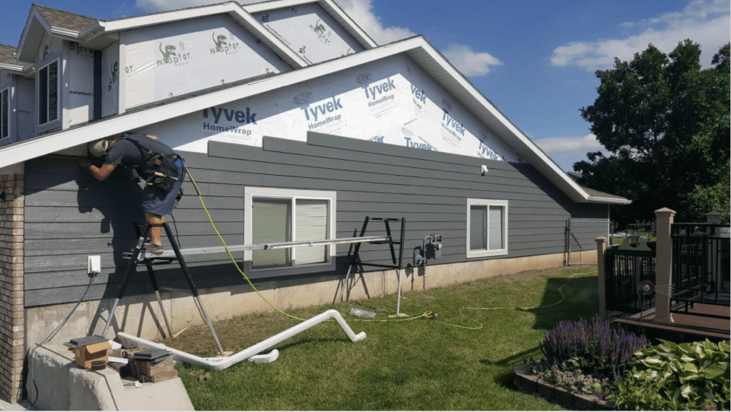 siding contractor installing maintenance free siding on a home in Rapid City, SD