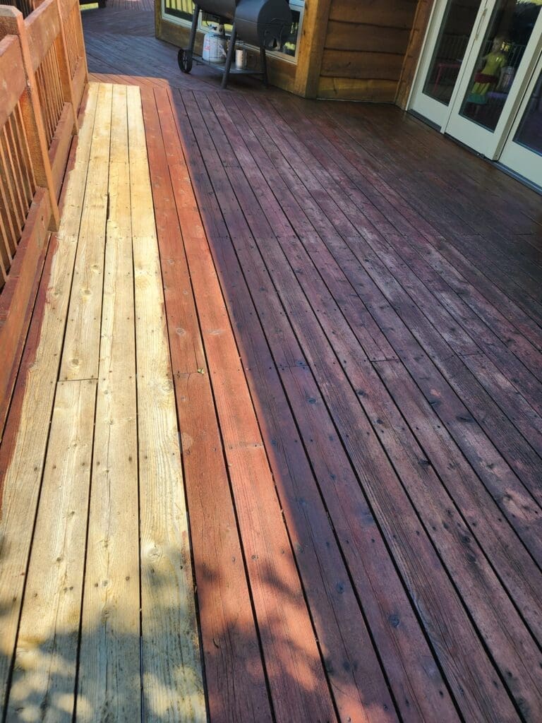 A wooden deck with a fresh stain is shown.
